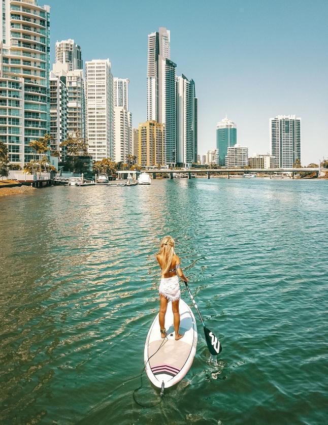 Lady in Surfers Paradise on Stand Up Paddle Board